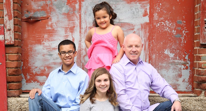 Allen with Zackery (left), Toshia (13, center) and Maleah (6, back middle)