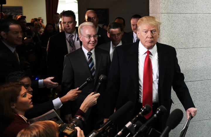 President Donald Trump and Health and Human Services Secretary Tom Price arrive at the U.S. Capitol to meet with the Republican House Conference on March 12, 2017.