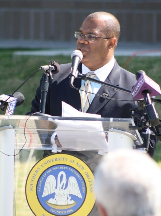 <p><em>Leading a press conference as Southern University at New Orleans’ PR director in 2011</em></p>