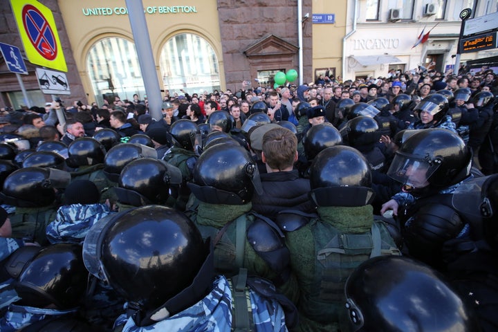 People take part in Russian opposition activist Alexei Navalny's anti-corruption rally in Tverskaya Street.