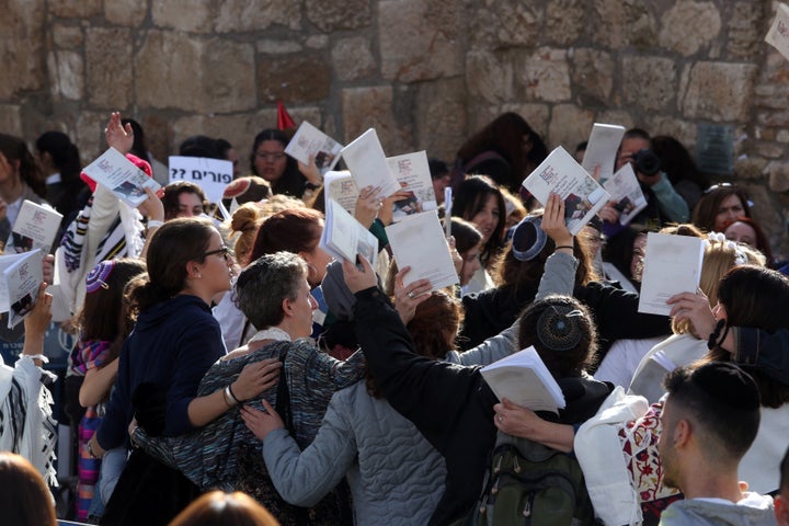 Members of the Women of the Wall take part in prayers on February 27, 2017, during a prayer service at the Western Wall plaza, in the Old city of Jerusalem.