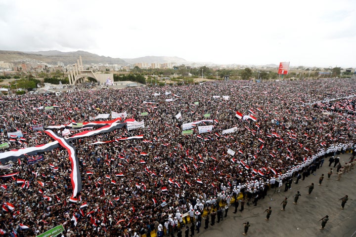 Supporters of the Houthi movement and Yemen's former president Ali Abdullah Saleh attend a joint rally to mark two years of the military intervention by the Saudi-led coalition, in Sanaa, Yemen March 26, 2017