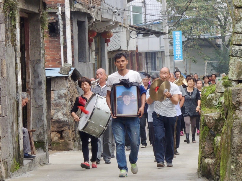 <strong>Villagers mourn with a march.</strong>