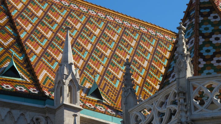 The patterned roof tiles of Budapest’s Matthias Church were added in the late nineteenth century by architect Frigyes Schulek.