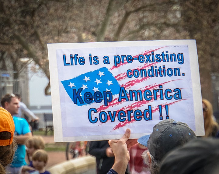 Rally in Support of the Affordable Care Act. Image licensed under <a rel="nofollow" href="https://www.flickr.com/photos/taed