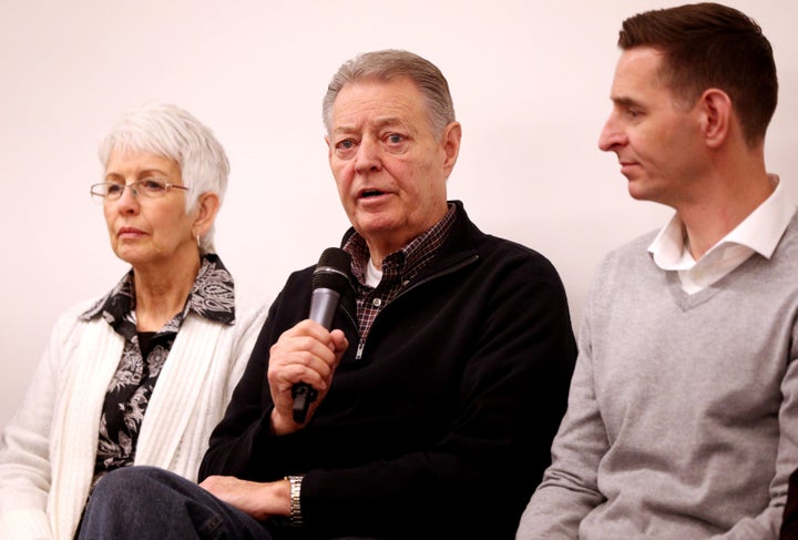 Dimmon Payne (centre), his wife Sandra (left), and Clint Payne (right) parents and brother, respectively, of Mellissa the wife of US tourist Kurt Cochran.