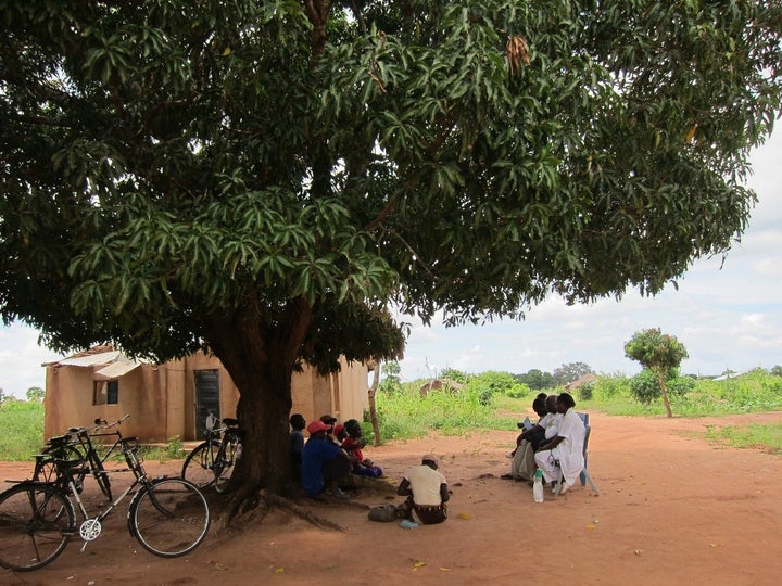 A community-facility co-management committee meets in Nampula, Mozambique.