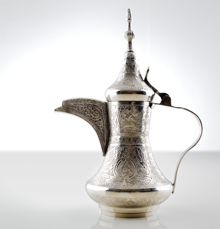 A very ornate dallah, used for making arabic coffee.
