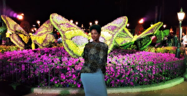 A. Comeaux fell in love with the colorful butterfly topiaries.