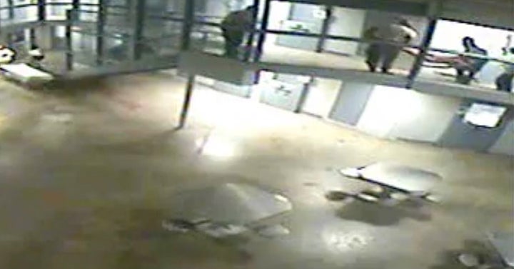 Surveillance video the night inmate Darren Rainey died shows prison staffers carrying his body from the second-floor shower down to a stretcher.