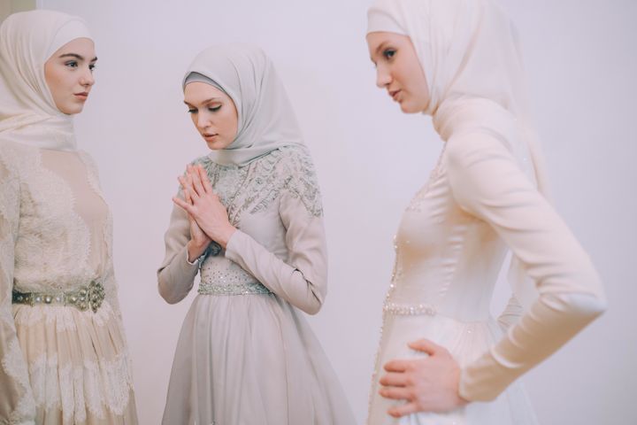 Models backstage during Firdaws runway show led by Aishat Kadyrova at Mercedes-Benz Fashion Week Russia