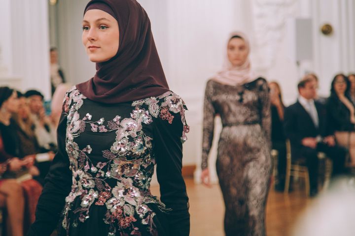 Models present gowns during Firdaws runway show led by Aishat Kadyrova at Mercedes-Benz Fashion Week Russia