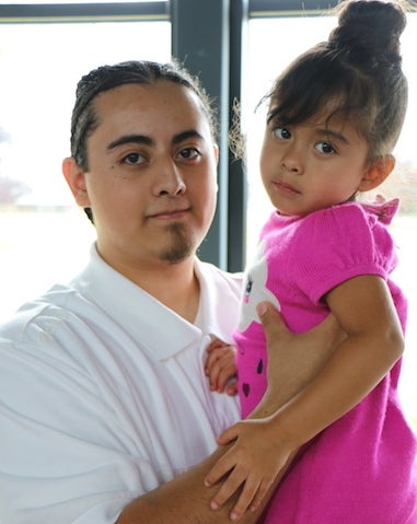 Daniel visiting with his daughter Mila at Green Hill School Juvenile Detention Center before he was transferred to the adult prison in August 2016.