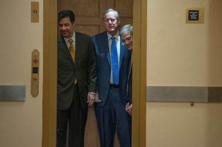 House Freedom Caucus members Raul Labrador (R-Idaho), left, Mark Meadows (R-N.C.) and Jim Jordan (R-Ohio) head to the House floor for a procedural vote on the American Health Care Act on March 24.