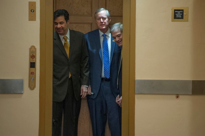 House Freedom Caucus members Raul Labrador (R-Idaho), left, Mark Meadows (R-N.C.) and Jim Jordan (R-Ohio) head to the House floor for a procedural vote on the American Health Care Act on March 24.