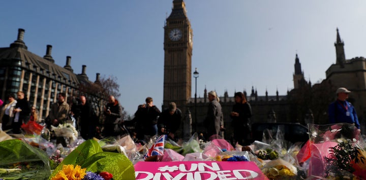 Floral tributes lie in Parliament Square following the March 27 2017 attack in Westminster, central London, Britain.