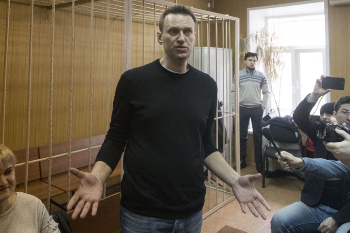Russian opposition politician Alexei Navalny appears in a courtroom after being detained during an anti-corruption 