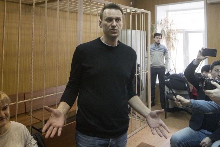 Russian opposition politician Alexei Navalny appears in a courtroom after being detained during an anti-corruption rally in Moscow on March 27, 2017.