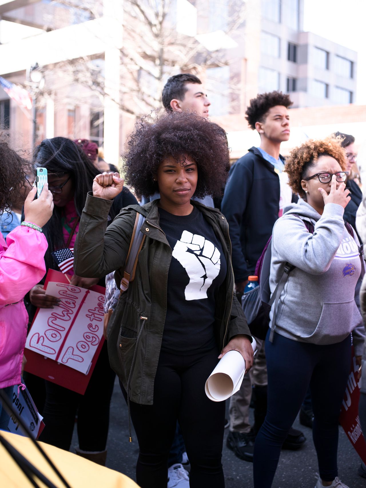 A woman holds up her fist during the Moral March on Feb 11.