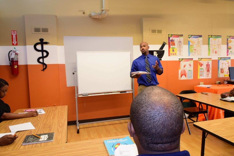 Dr. Chester teaching students.
