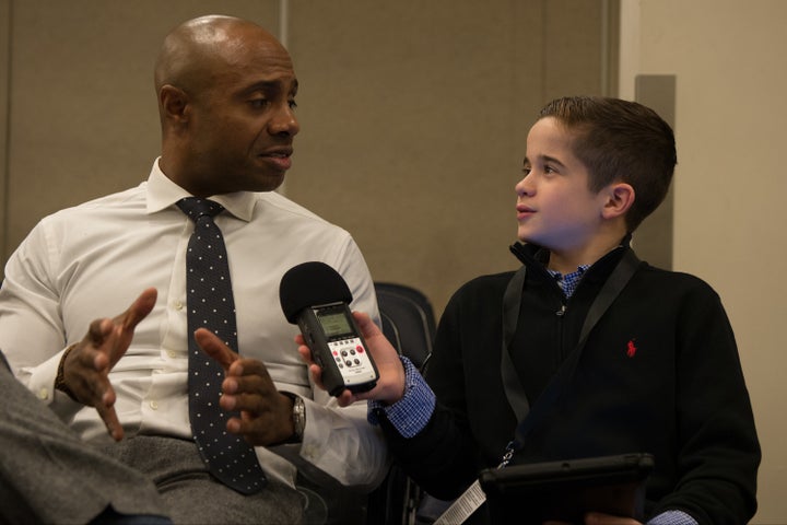 Sports Illustrated Kids reporter Max Bonnstetter at Madison Square Garden in December 2016 interviewing basketball analyst and former player Jay Williams.