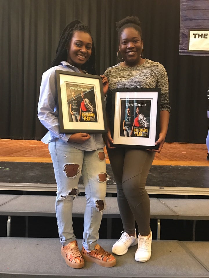 Kyle Webster-Cazeau and Meggie Noel pose with pictures of their 2016 Bostonian of the Year features. 