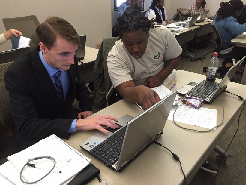Mike and Delvon of the Philadelphia class are busy preparing for the CompTIA A+ exam. 