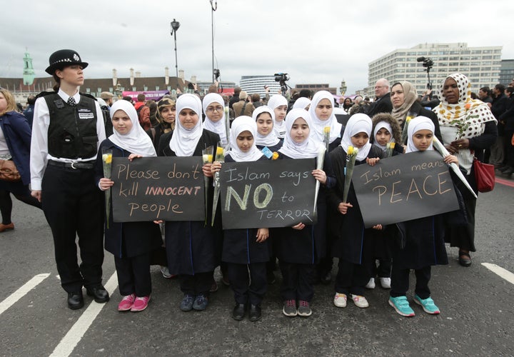 A vigil is held on Westminster Bridge in London, exactly a week since the Westminster terror attack took place.