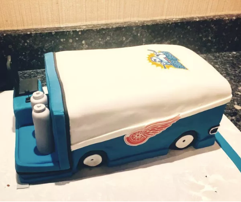 The chocolate wedding cake was shaped like a Zamboni.