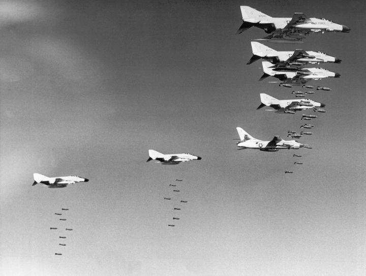 U.S. Air Force planes drop bombs on targets in North Vietnam. Jan. 31, 1966.