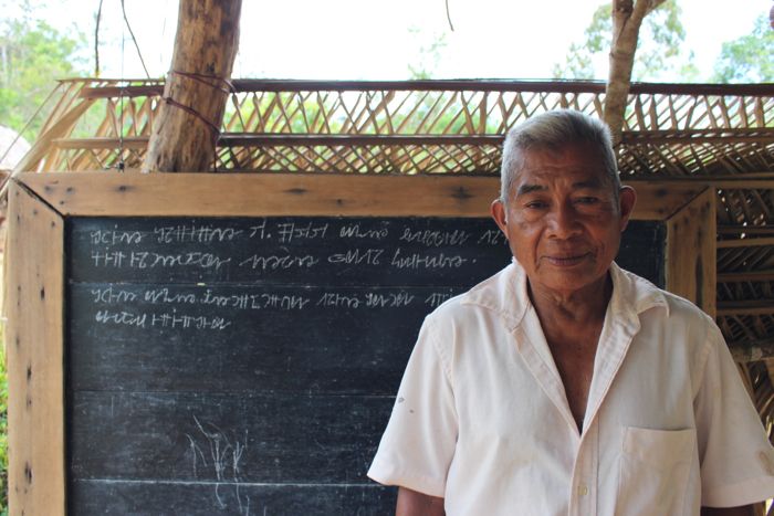 Manolo Miranda developed the written form of the Ngäbe language, called “Ngäbere,” when he received a vision under a sapote tree near Kiad. Now he teaches and writes books in the village’s specialized language and culture center. (Tracy L. Barnett)