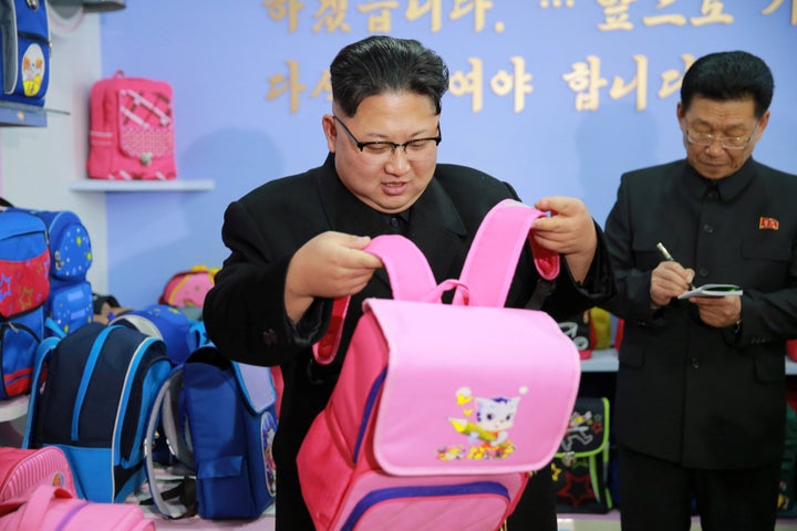 Kim Jong Un during a visit to a newly-build bag factory in Pyongyang 