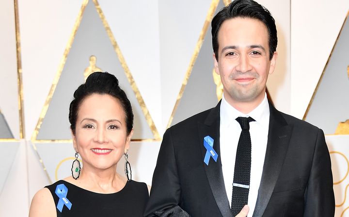 Lin-Manuel Miranda and his mother, Luz Towns-Miranda, wearing ACLU ribbons at the Oscars.