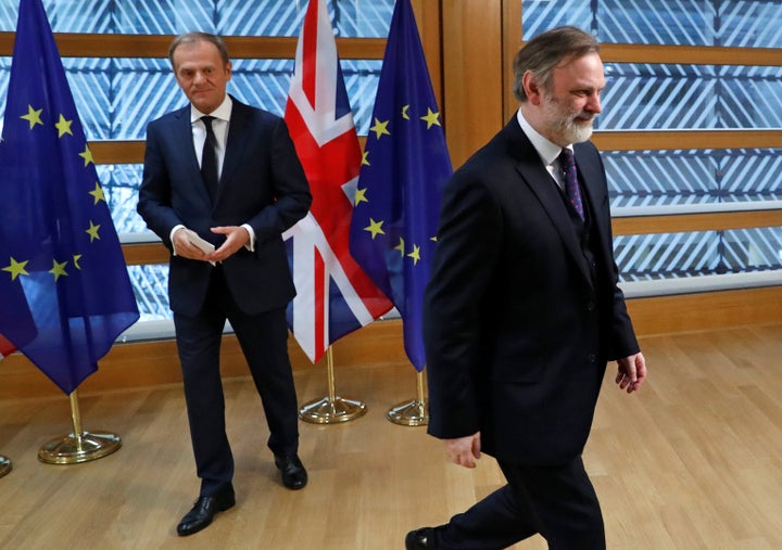 Britain's permanent EU representative Tim Barrow leaves after he delivered May's Brexit letter to EU Council President Donald Tusk