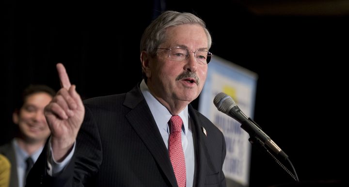 Iowa Governor Terry Branstad signed legislation on Thursday to roll back local minimum wage increases across the state.