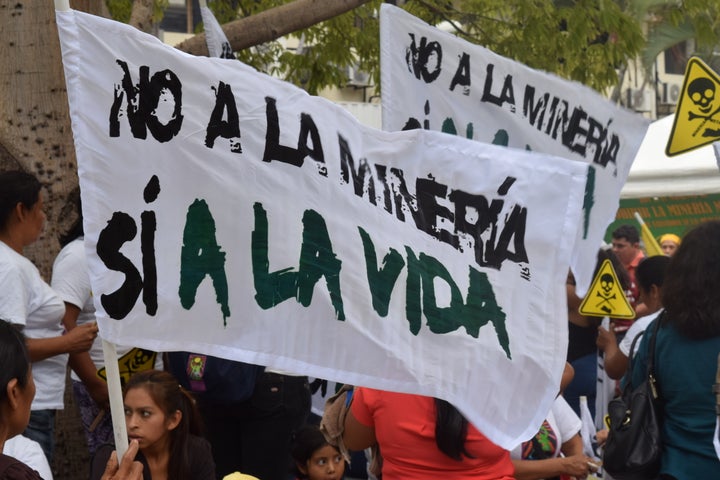 Activists Wave Banners With the Slogan of the Anti-Mining Movement