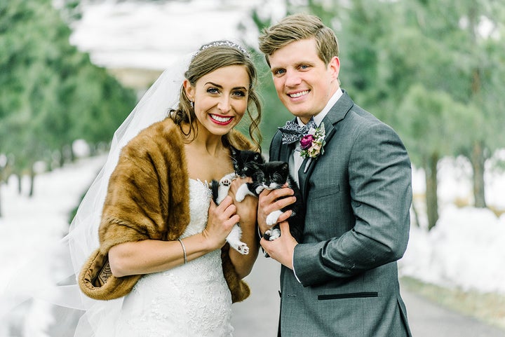 The bride wore a vintage-inspired faux fur to keep warm.