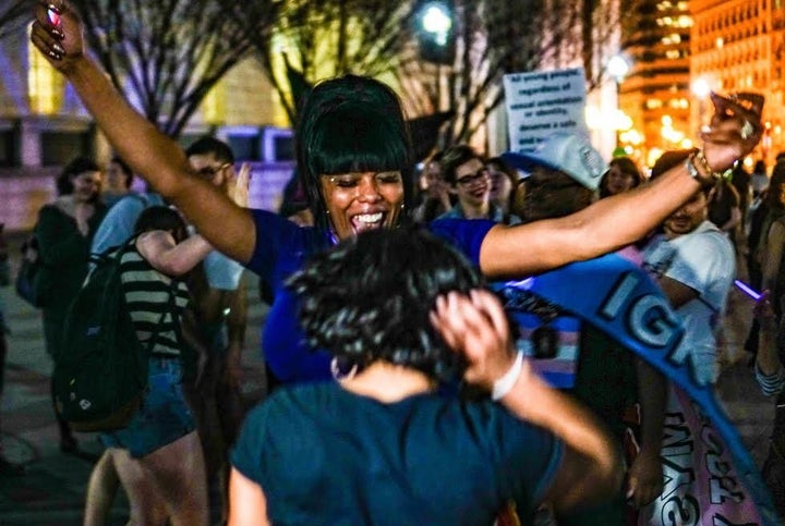 Protesters dancing outside of Trump Hotel.