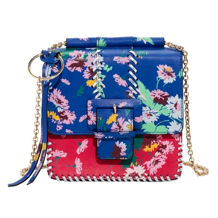 <p><a rel="nofollow" href="http://rstyle.me/n/ci6gmsjduw" target="_blank">Floral Buckle Mini Bag</a>, & Other Stories $145</p>