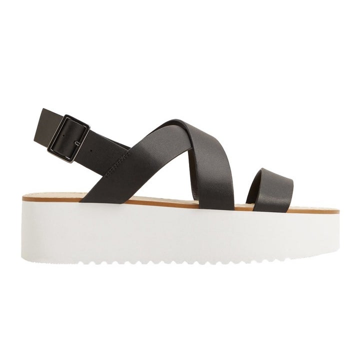 <p><a rel="nofollow" href="http://www.anrdoezrs.net/links/3550561/type/dlg/http://shop.mango.com/US/p0/women/accessories/shoes/heeled-sandals/platform-strap-sandals?id=83005018_99&n=1&s=accesorios.zapatos" target="_blank">Platform Strap Sandals</a>, Mango $60</p>