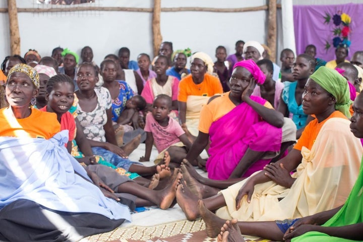 Organizations like the IRC run safe spaces in Bidibidi camp for women refugees to gather and discuss issues like sexual assault.