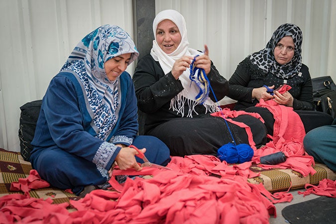 Emm Ali and other refugee women. Photo: UN Women/Christopher Herwig
