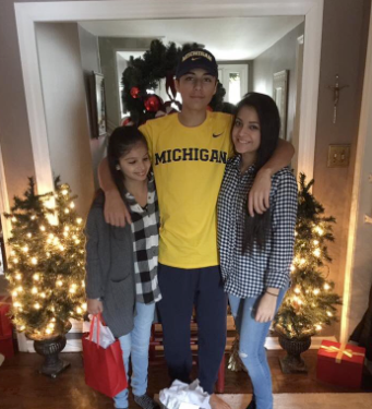 The Herrera sisters with their brother, Arthur.