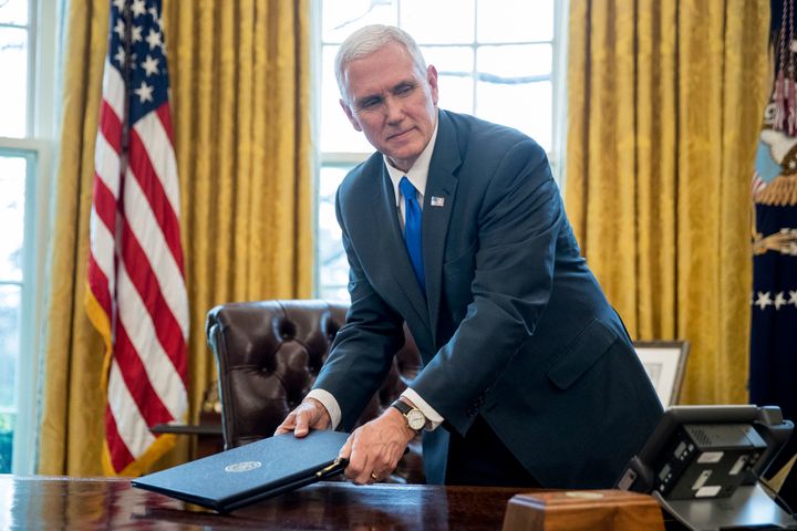 Pence collects up the unsigned orders