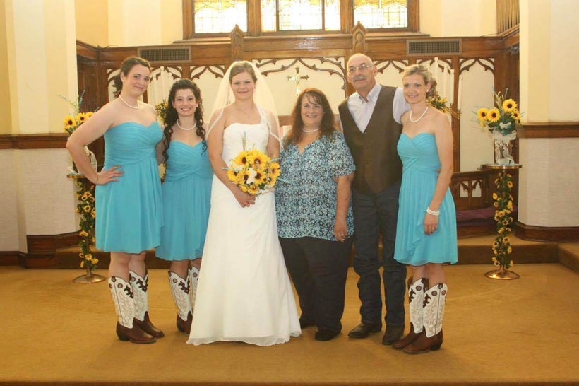 Lori, her husband Ron, and their four daughters at the wedding of their youngest daughter. Lori’s death is being investigate