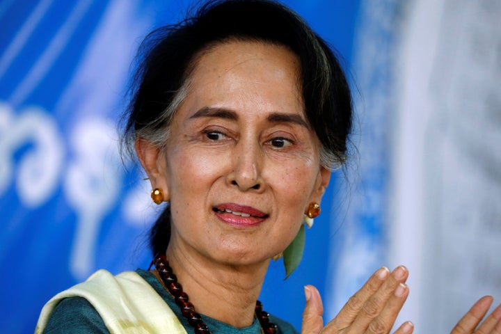 Myanmar State Counselor Aung San Suu Kyi smiles as she visits an IDP camp outside of Myitkyina, the capital city of Kachin st