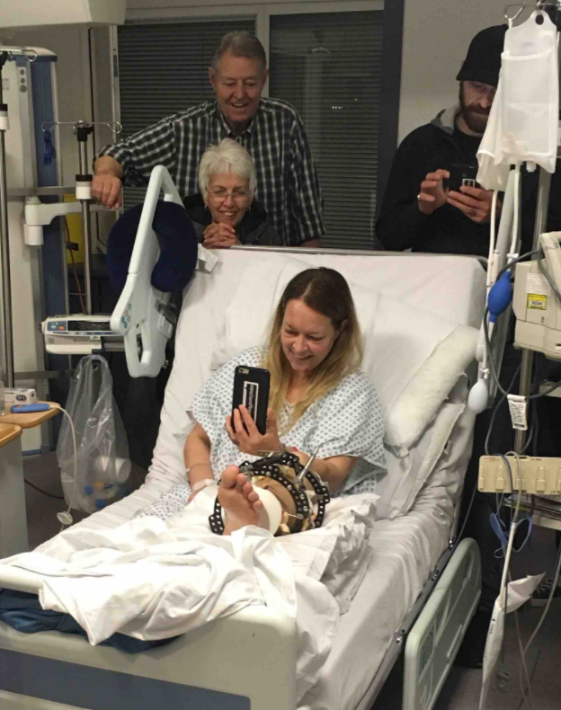 Melissa Cochran smiles from her hospital bed