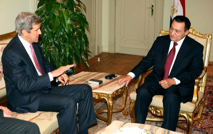 Under pressure from his U.S. ally and others in the international community, Mubarak eventually allowed moderate democratic reform in Egypt. He is pictured here in 2006 with U.S. Senator John Kerry.