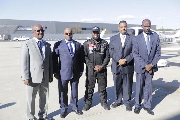 All formed part of a high-level delegation to welcome the historic aviator on the tarmac at Dulles Airport, including: the Am
