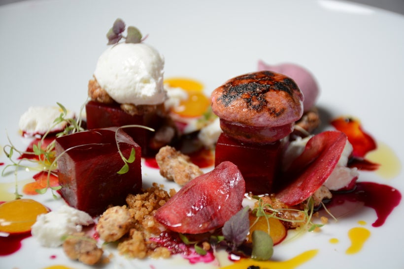 Beetroot with Red Beet Tartare, Beet Mellow and Beet Macaron with whipped goat cheese, and passion fruit.